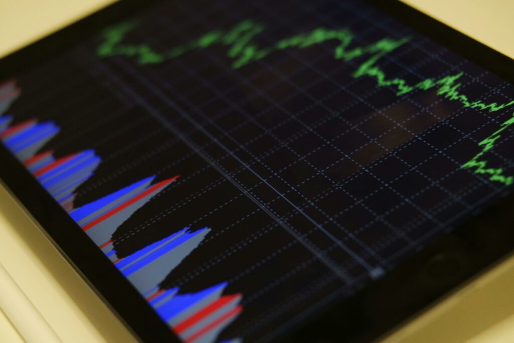 Close-up of a financial graph on a tablet screen, showing market trends.